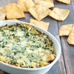 Lighten up your game day and party appetizers with this SKINNY Spinach Artichoke Dip. Tastes AMAZING but with less calorie! #recipe #partyfood