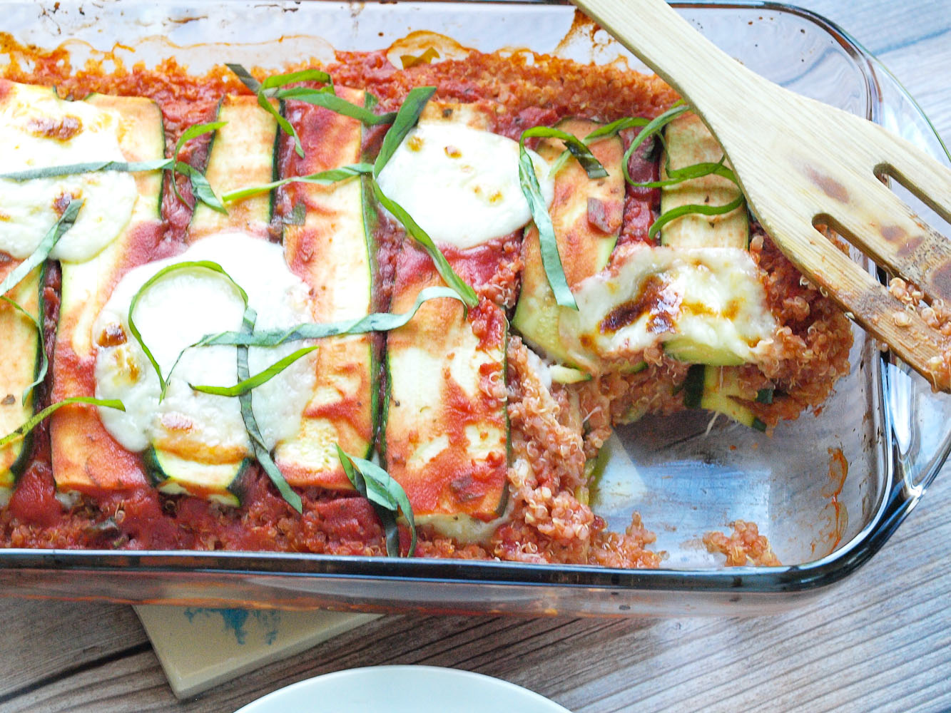 Vegetarian Zucchini Quinoa Lasagna recipe. This is a great, gluten-free way to enjoy the flavors of lasagna! It's so much lighter than regular lasagna! This is a perfect summer dinner that the whole family will love.