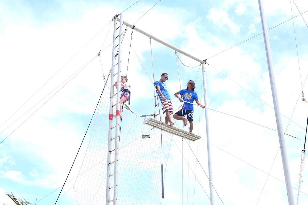 Meghan climbing the trapeze at Club Med Cancun Yucatan