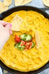 Dipping in the Vegan Queso Dip