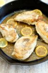 Close up picture of Easy Lemon Skillet Chicken Recipe in cast iron skillet pan