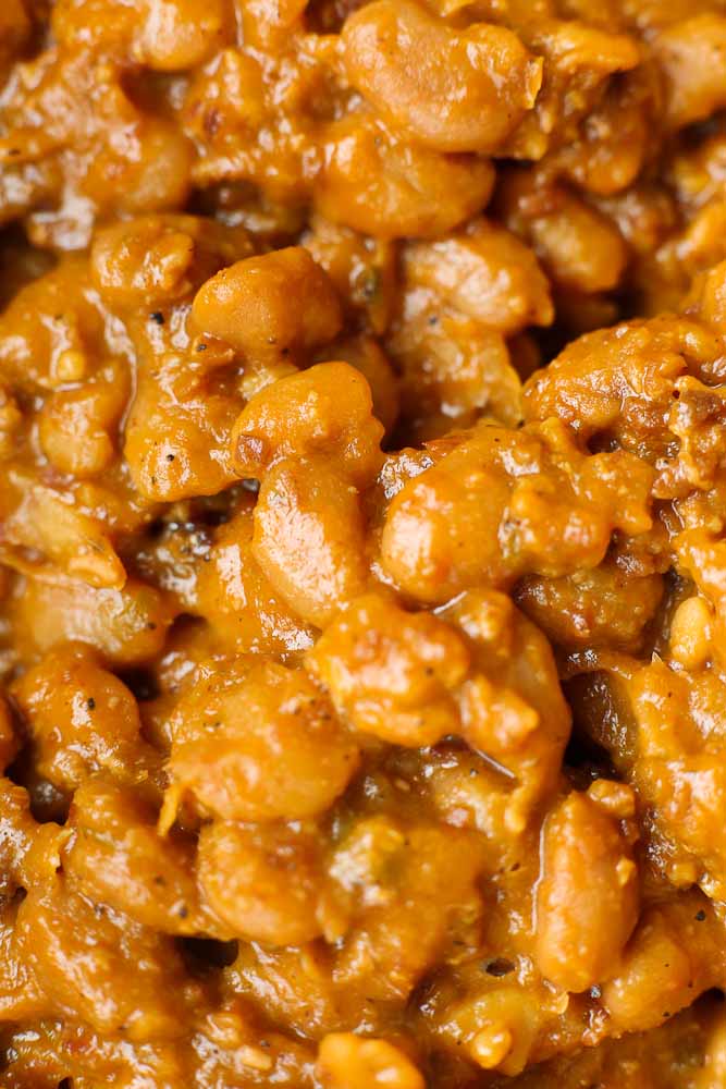 Close up shot of homemade baked beans from scratch using dried beans