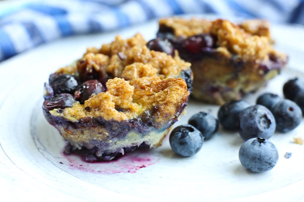 Blueberry BAked French Toast Cups with fresh blueberries on the side