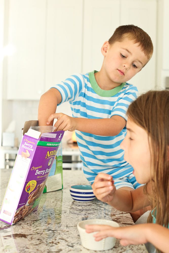 Luke helping himself to more Annie's cereal