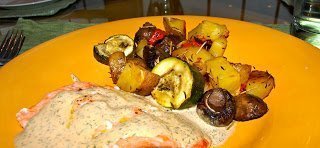 Salmon with dill sauce and roasted vegetables