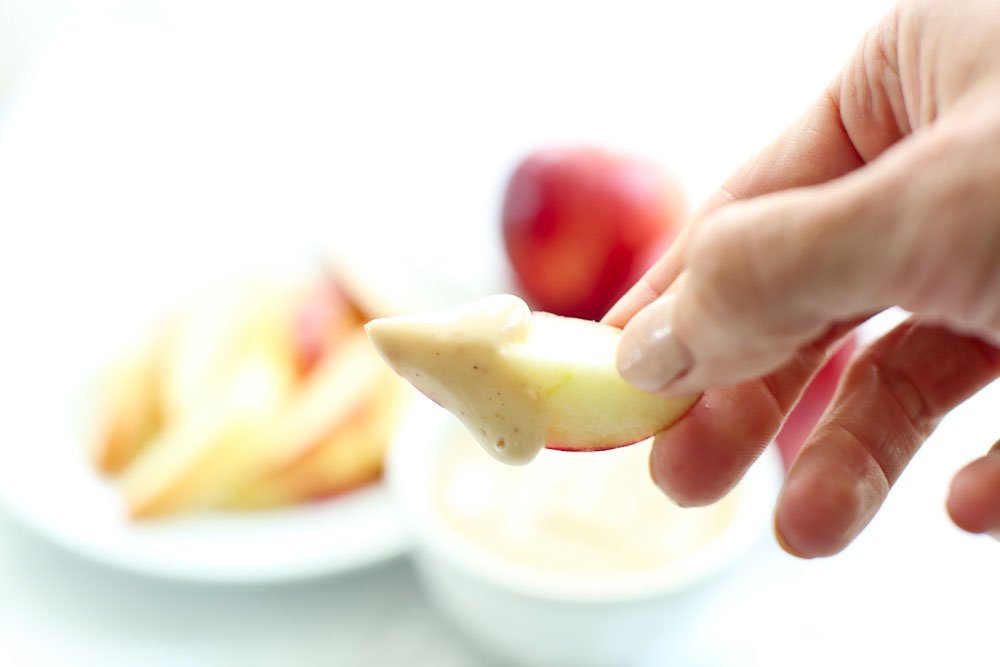 dipping in action Healthy Simple Yogurt Peanut Butter Apple Dip