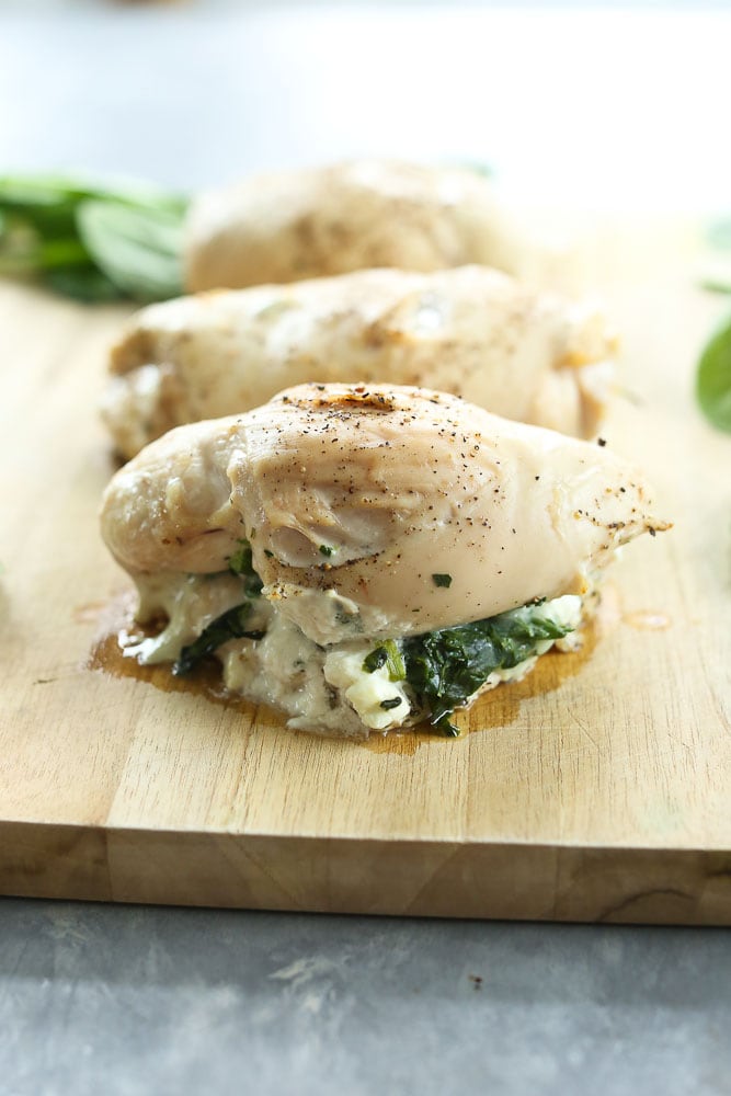 Spinach and Goat Cheese Stuffed Chicken Breasts Recipe resting on cutting board