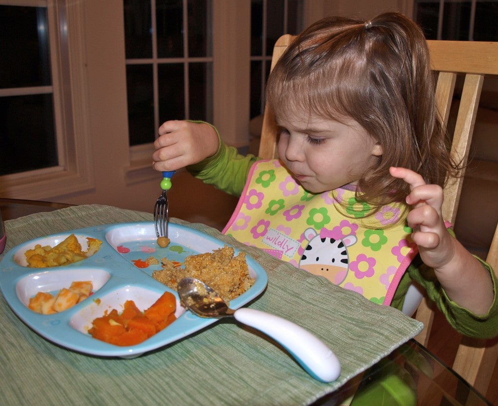 My toddler Meghan eating chickpeas