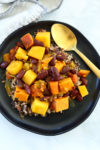 Root Vegetable and Red Bean Stew Recipe vegan recipe on black plate with rice