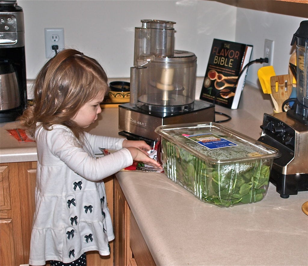 Meghan helping make a green grilled cheese