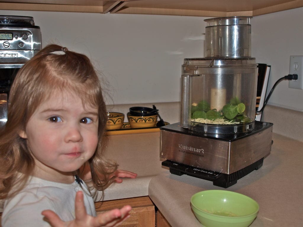 Meghan helping make green grilled cheese