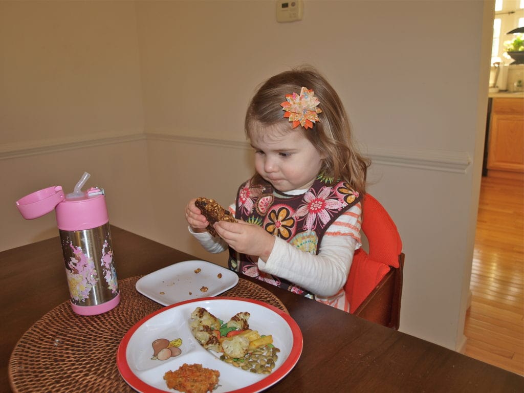 Meghan eating dessert