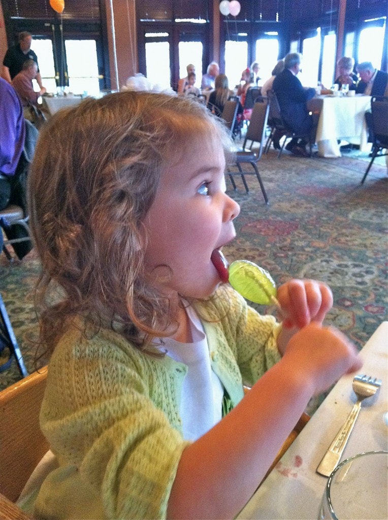 Meghan eating a sucker