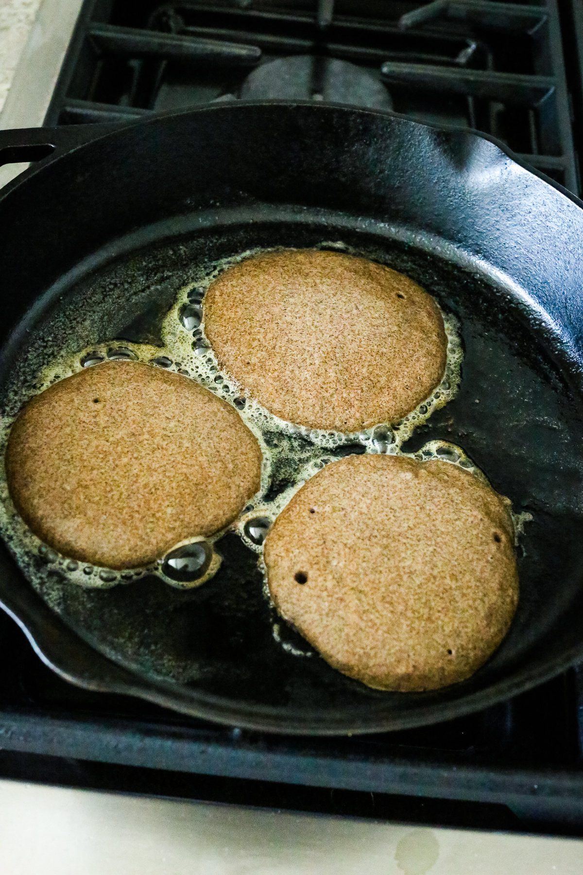 pancakes in a cast iron skillet