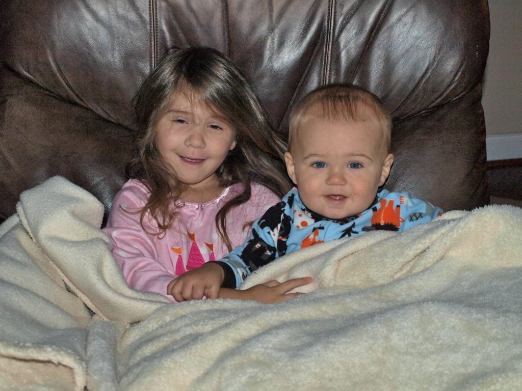 Luke and Meghan snuggling