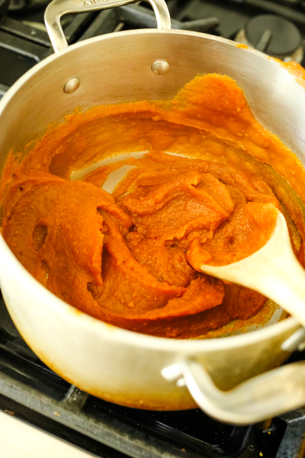 stirring sweet potato mixture