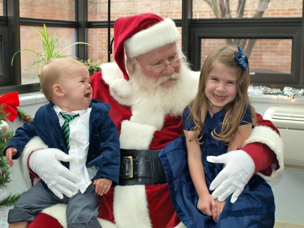 Luke and Meghan visiting Santa