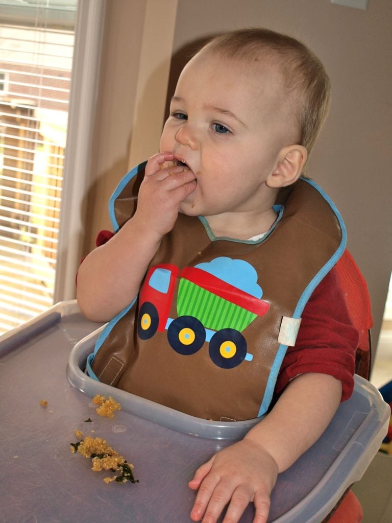 Luke eating warm quinoa salad with apple and kale