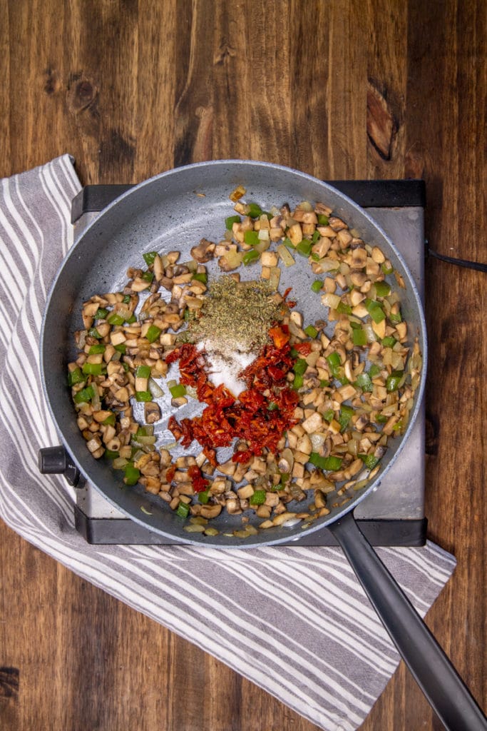 a pan with the ingredients of the stuffed spaghetti squash