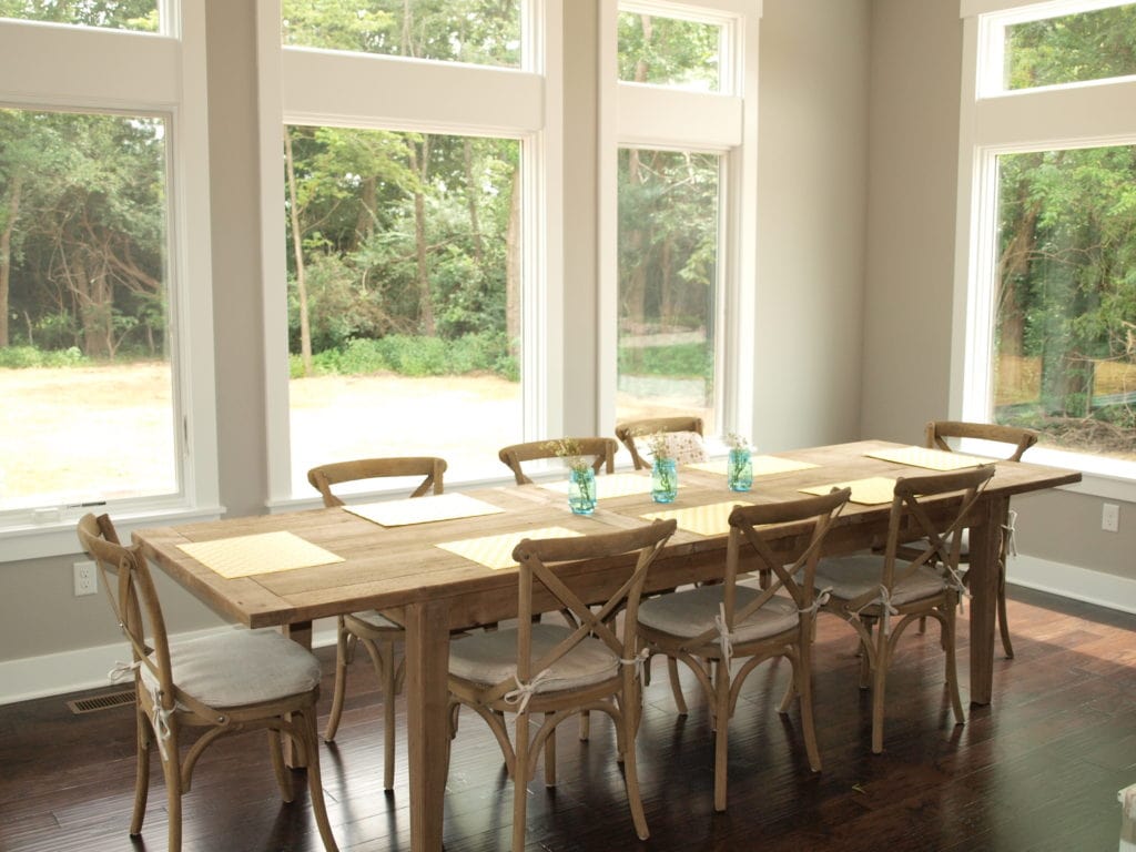 Large dining table made from reclaimed wood.