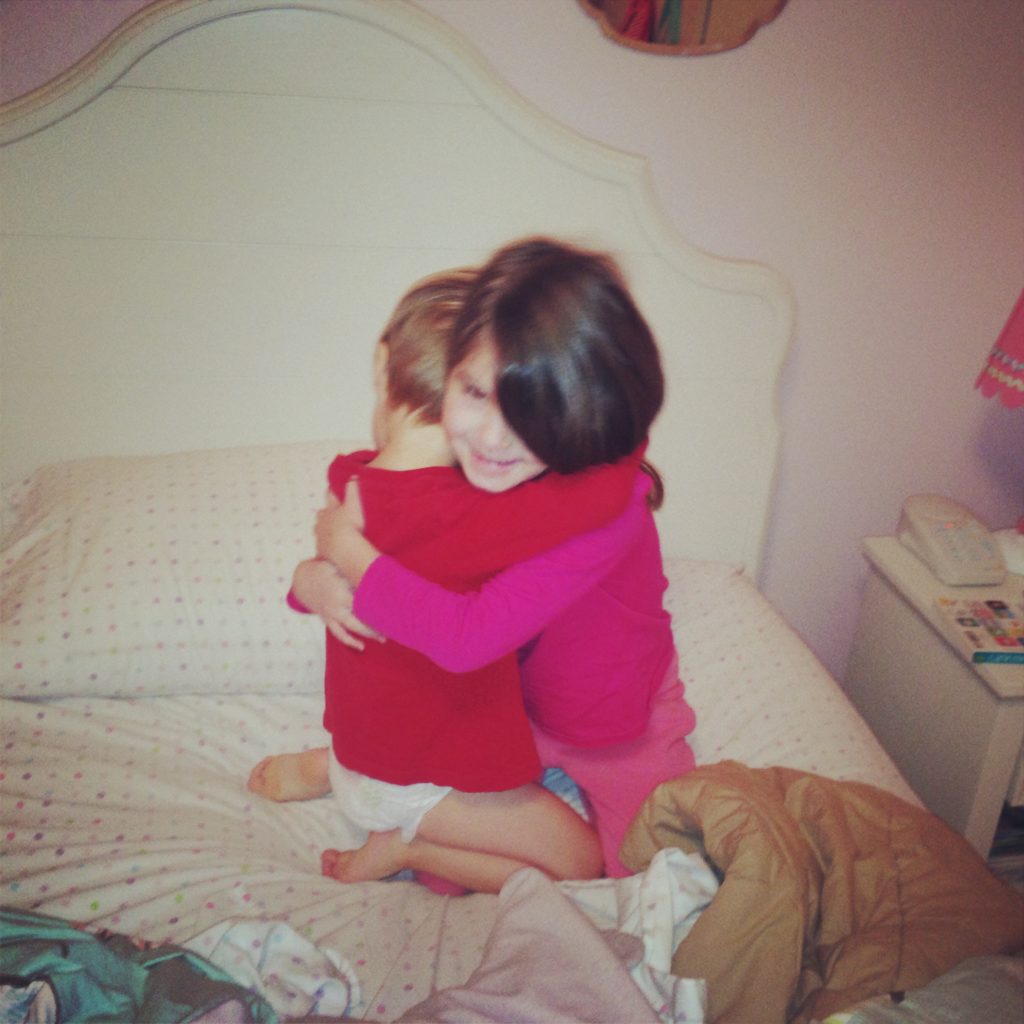 Luke and Meghan hugging