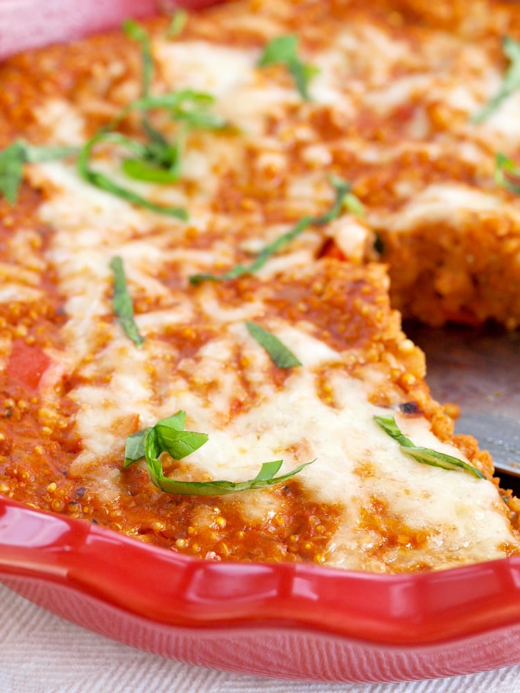 Pizza night just got a makeover! This quinoa pizza pie has the pizza flavor you love but is much healthier!