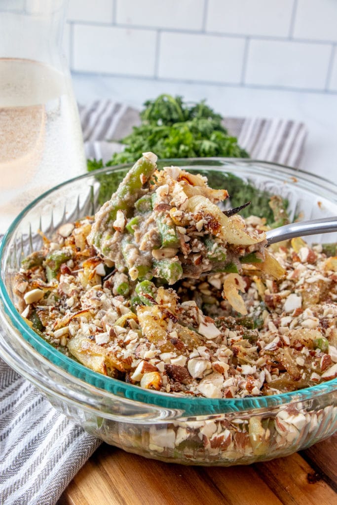 HEALTHY GREEN BEAN CASSEROLE recipe with a serving spoon