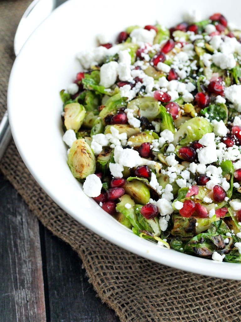 Warm Brussels Sprouts Salad with Pomegranate and Goat Cheese. Think you don't like brussels sprouts? Get ready to fall in love!