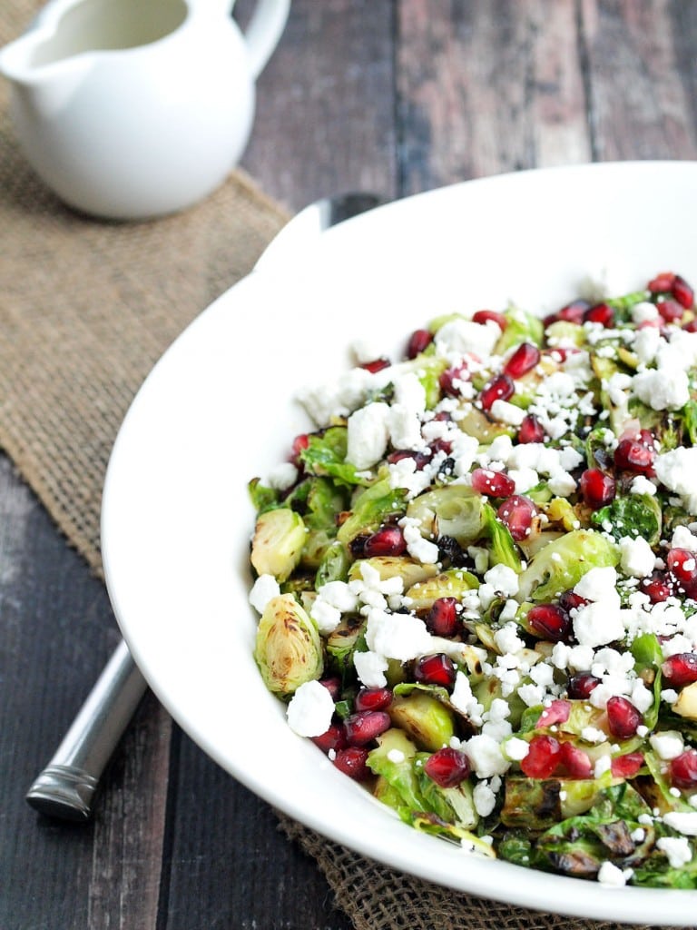 Warm Brussels Sprouts Salad with Pomegranate and Goat Cheese. Think you don't like brussels sprouts? Get ready to fall in love!