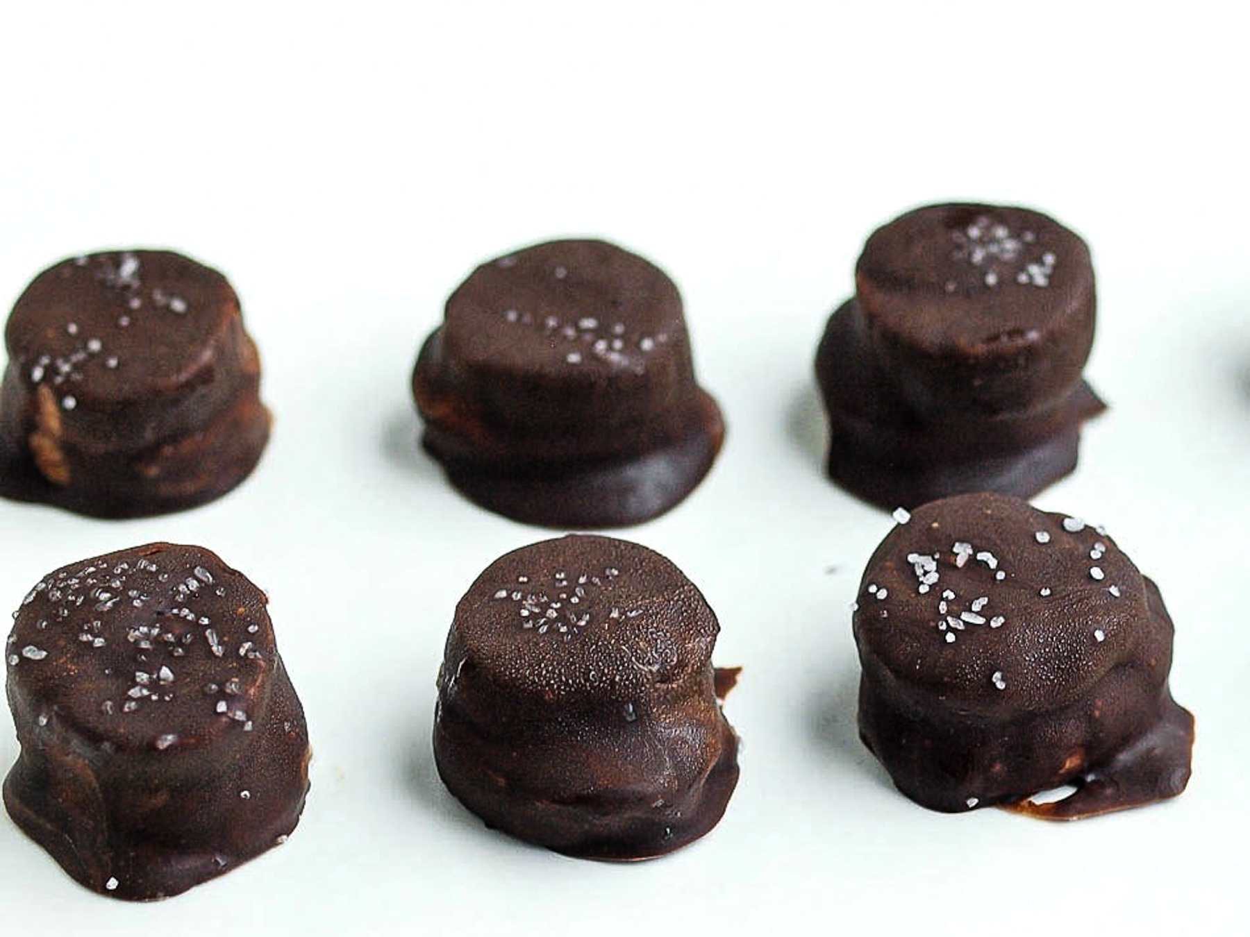 a row of banana bites with salt on top