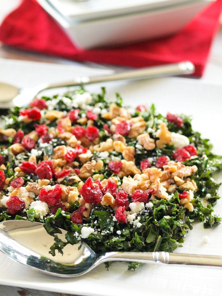 Chopped Kale Salad with Cranberries, Feta, and Walnuts. Yum! Kale never tasted so good. This is the BEST kale salad I've ever made. Quick, easy, and healthy. This would make a perfect holiday side dish!