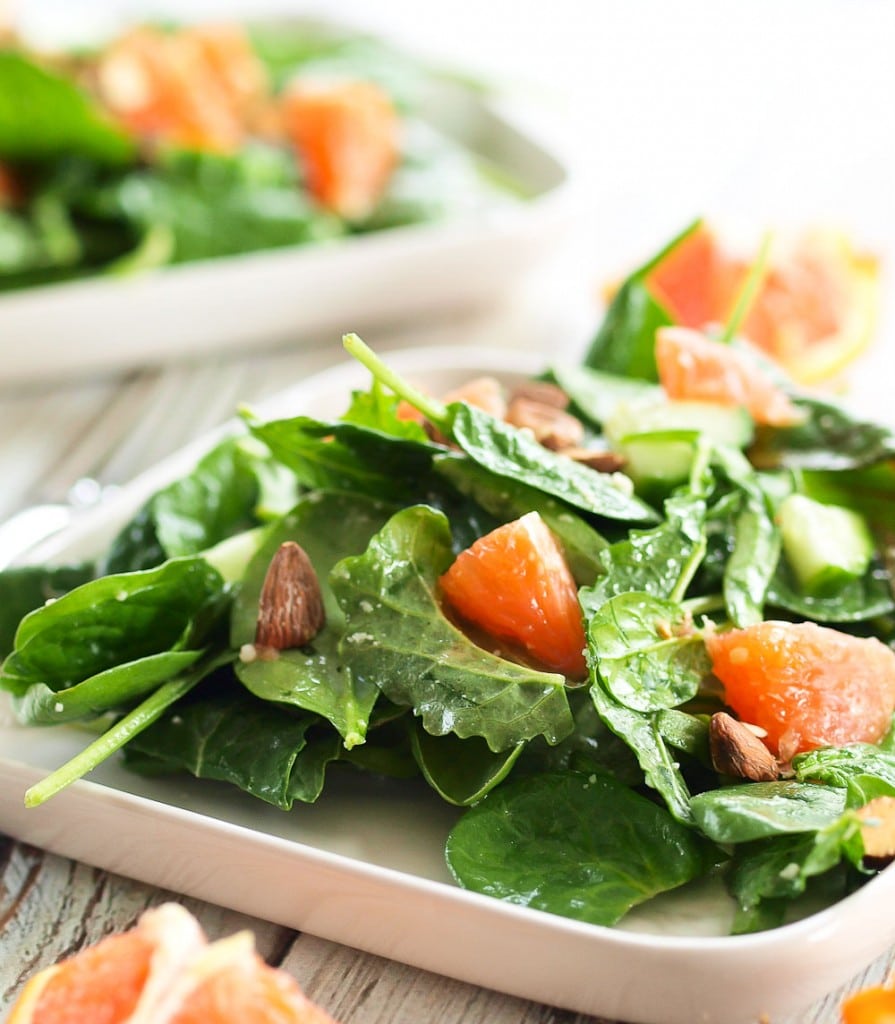 This Power Greens Salad with Cara Cara Orange, Almonds, and Parmesan is anything but boring! Brighten up your winter with this perfect salad.
