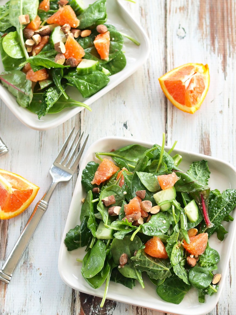 This Power Greens Salad with Cara Cara Orange, Almonds, and Parmesan is anything but boring! Brighten up your winter with this perfect salad.