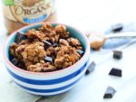 This Peanut Butter Chocolate Chunk Granola recipe is super crunchy and has big chunks! No refined sugar with intense peanut butter flavor. Great homemade granola recipe!