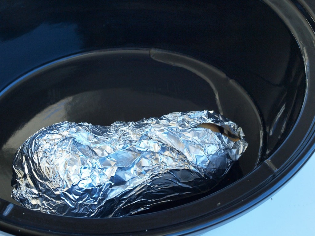 How to Cook Butternut Squash in the crockpot. It's so much easier to cook your butternut squash this way! How many times would your dinner prep be easier if you already had a cooked squash? More of a how-to than a recipe, but the post gives recipes ideas on what to do with the cooked squash. P.S. cutting through a butternut squash is so much easier when it's already cooked!