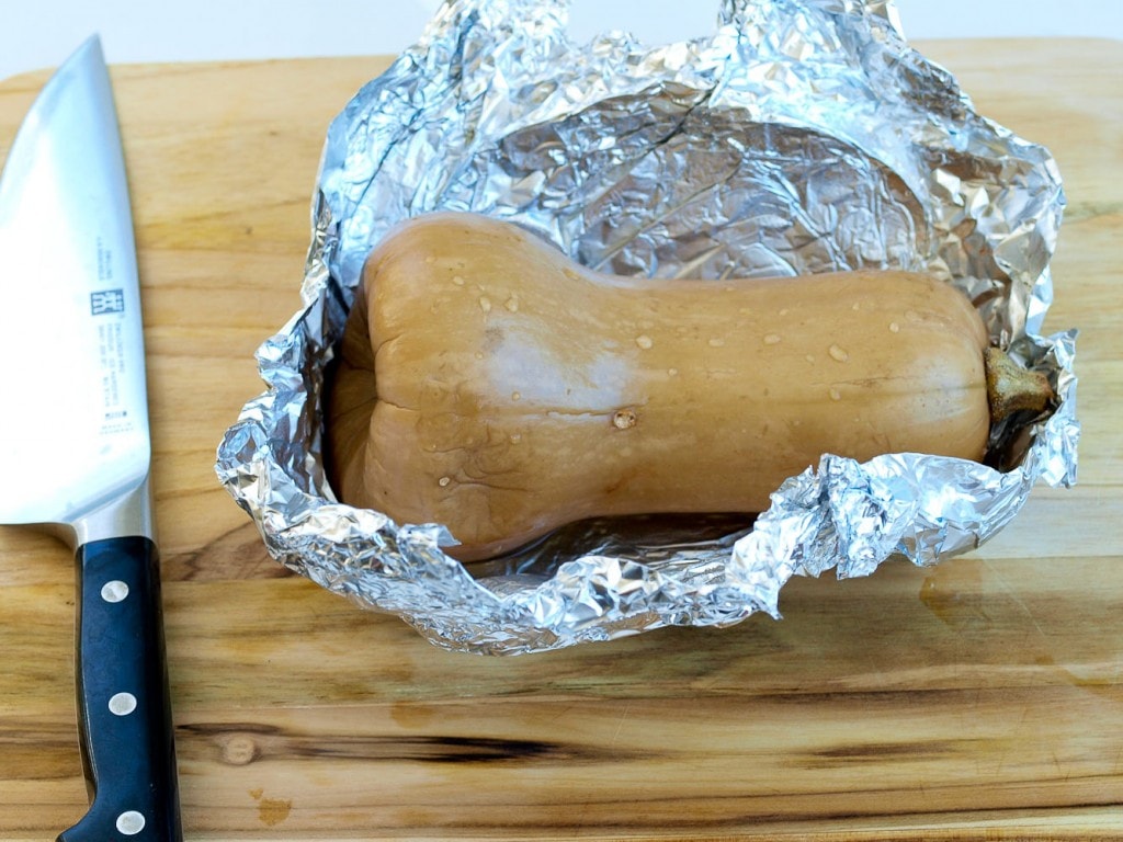 How to Cook Butternut Squash in the crockpot. It's so much easier to cook your butternut squash this way! How many times would your dinner prep be easier if you already had a cooked squash? More of a how-to than a recipe, but the post gives recipes ideas on what to do with the cooked squash. P.S. cutting through a butternut squash is so much easier when it's already cooked!