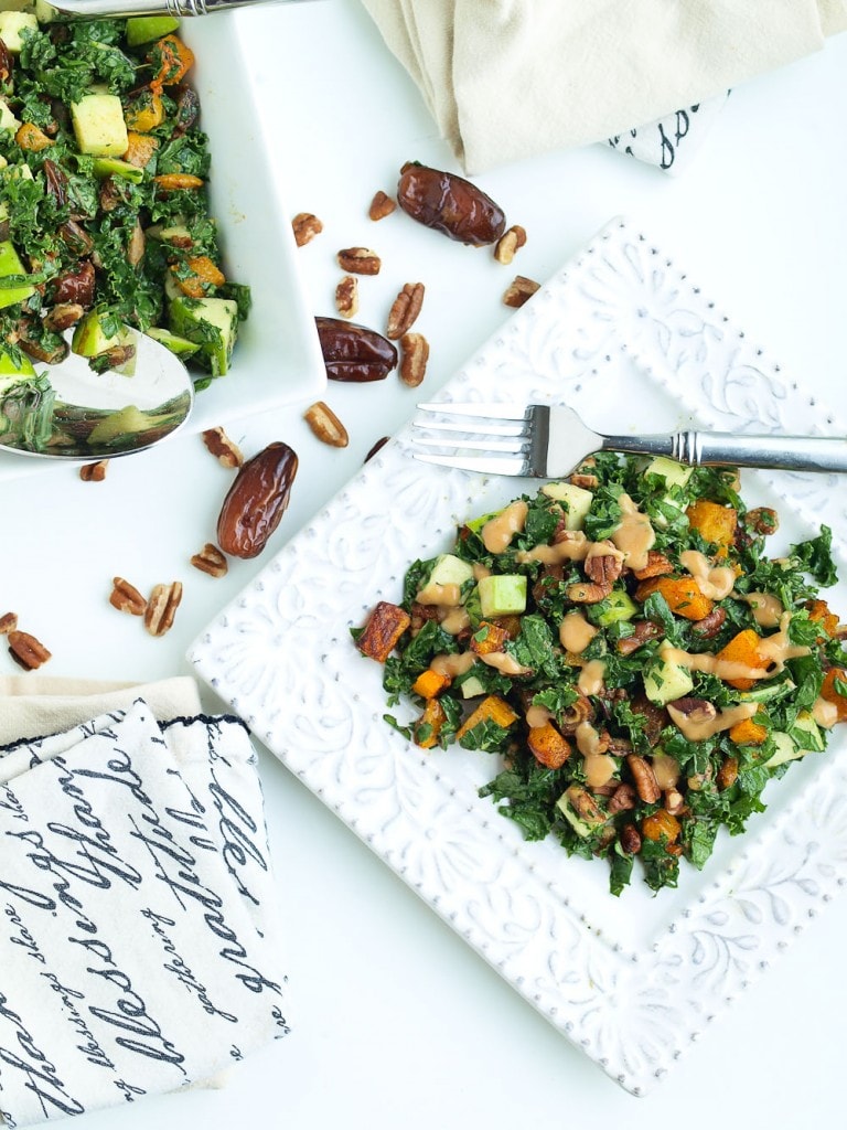 Autumn Kale Salad Recipe. This easy kale salad recipe will make your family beg them to serve them kale! The oil-free dressing is AMAZING. Gluten-free and vegan recipe.