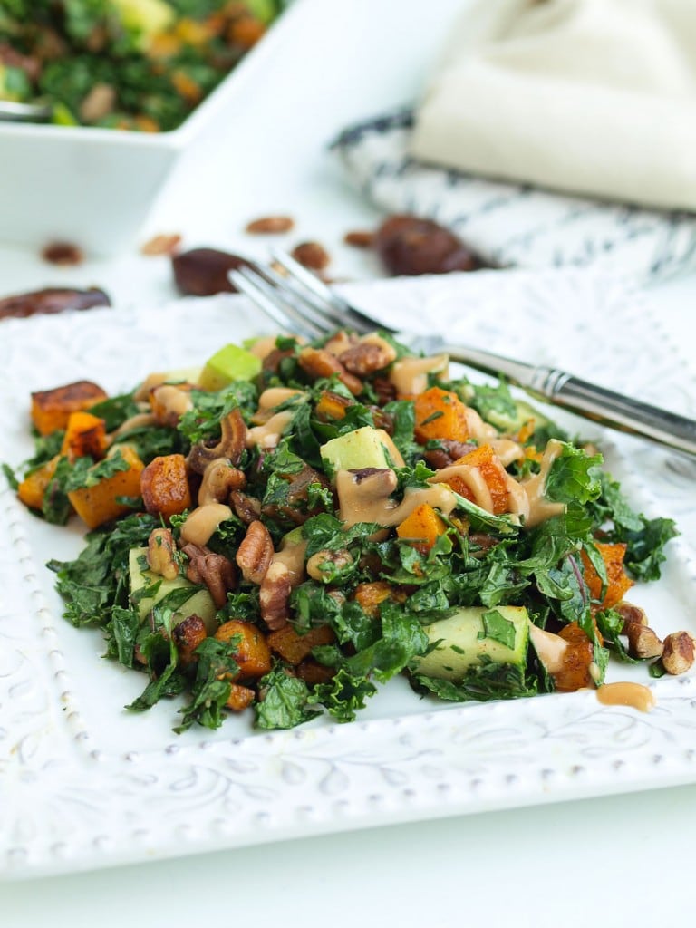 Autumn Kale Salad Recipe. This easy kale salad recipe will make your family beg them to serve them kale! The oil-free dressing is AMAZING. Gluten-free and vegan recipe.