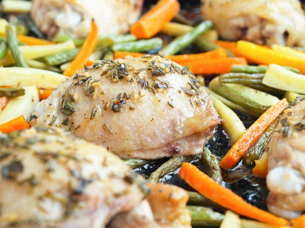 One Pan Chicken and Vegetables with Fresh Herbs Recipe. This is a healthy, clean eating recipe that is quick and easy for weeknight dinners. One pan means quick clean up. There's tons of flavor and the whole family will love it.
