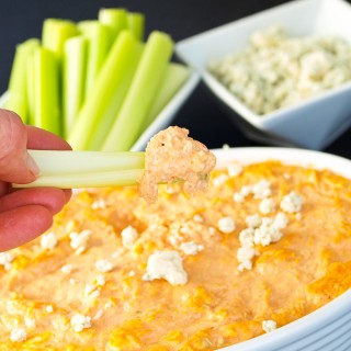 This Skinny Buffalo Chicken Dip is the perfect appetizer for your Super Bowl Party recipe line-up! No one will notice the missing calories or fat.