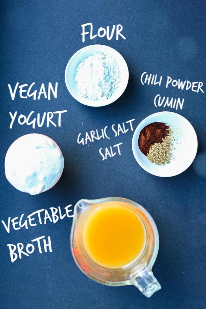 Vegan Nacho Cheese Ingredients: vegan yogurt, flour, spices, and vegetable broth