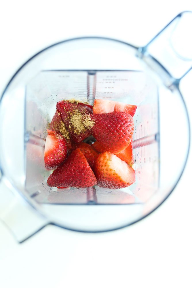 Strawberry Spinach Salad with Avocado and Strawberry Vinaigrette dressing--making the dressing with ingredients in the blender