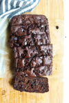 Double Chocolate Banana Zucchini Bread on a cutting board sliced