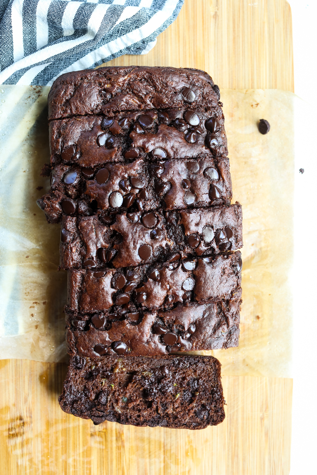 Double Chocolate Banana Zucchini Bread on a cutting board sliced