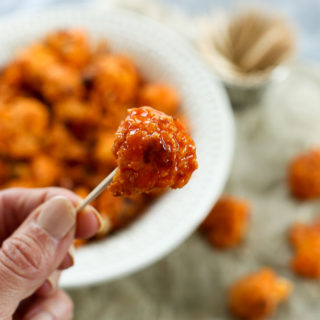 Close up shot of Buffalo Cauliflower Poppers (healthy football food recipe idea)