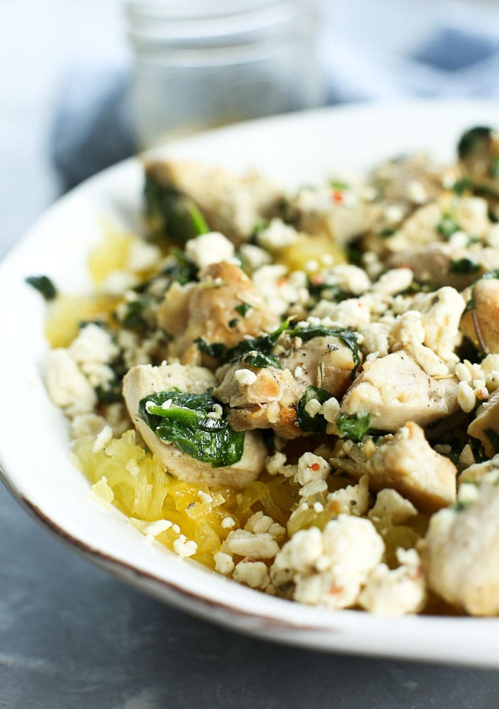 Close up view of Mediterranean Spaghetti Squash Bowl with Chicken and Spinach