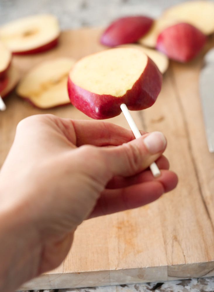 adding sticks to the Chocolate Covered Apple turkey pops