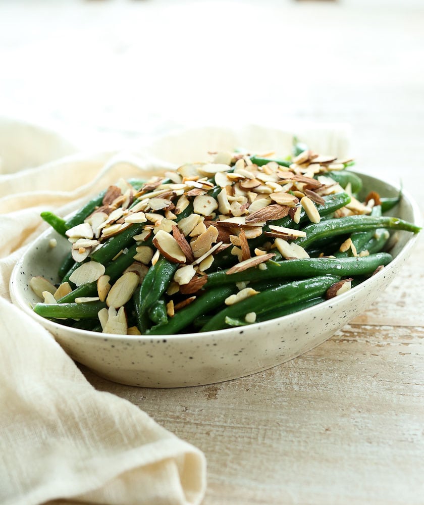 Side view of Garlic Butter Green Beans with Toasted Almonds Recipe