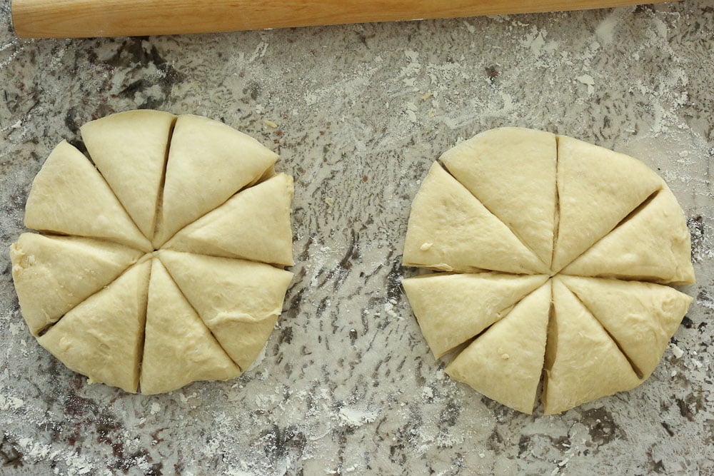 Perfect Bread Machine Dinner Rolls--two dough circles cut into eights with a rolling pin