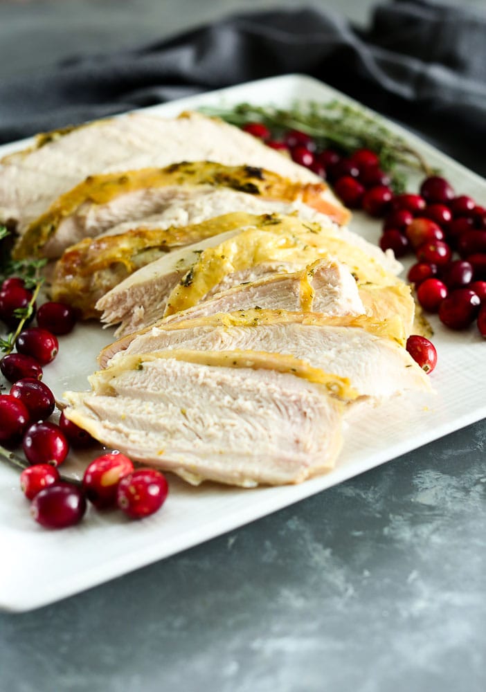 Butter and Herb Roasted Turkey Breast Recipe presented on a platter